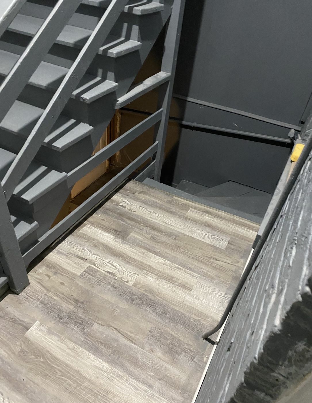 Landing under stair