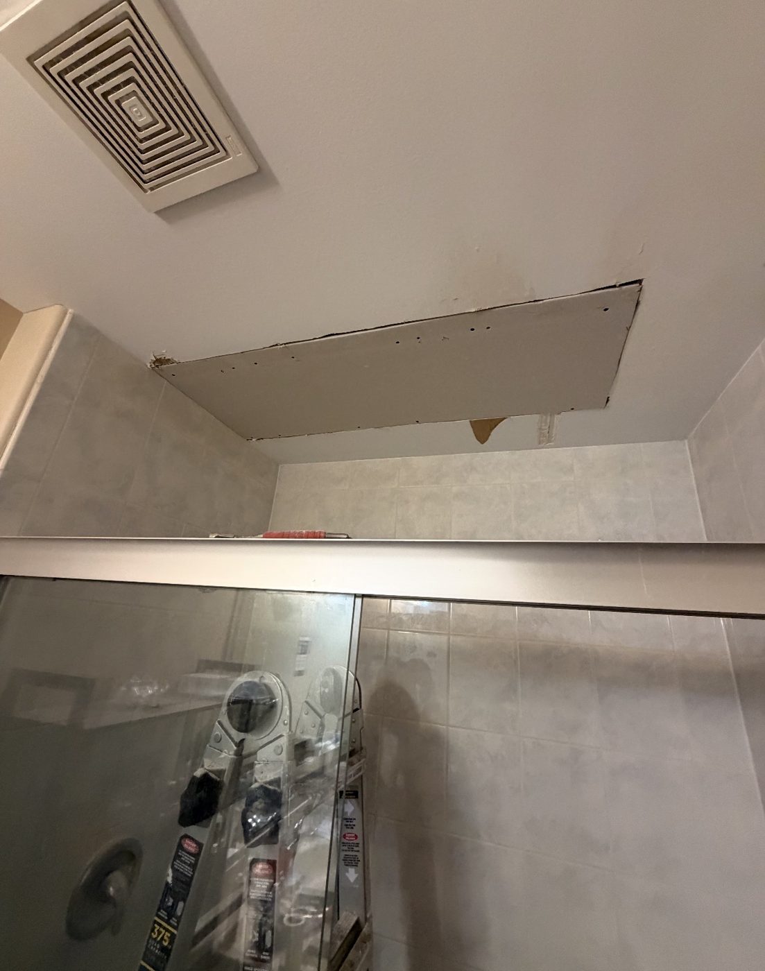 New drywall screwed in